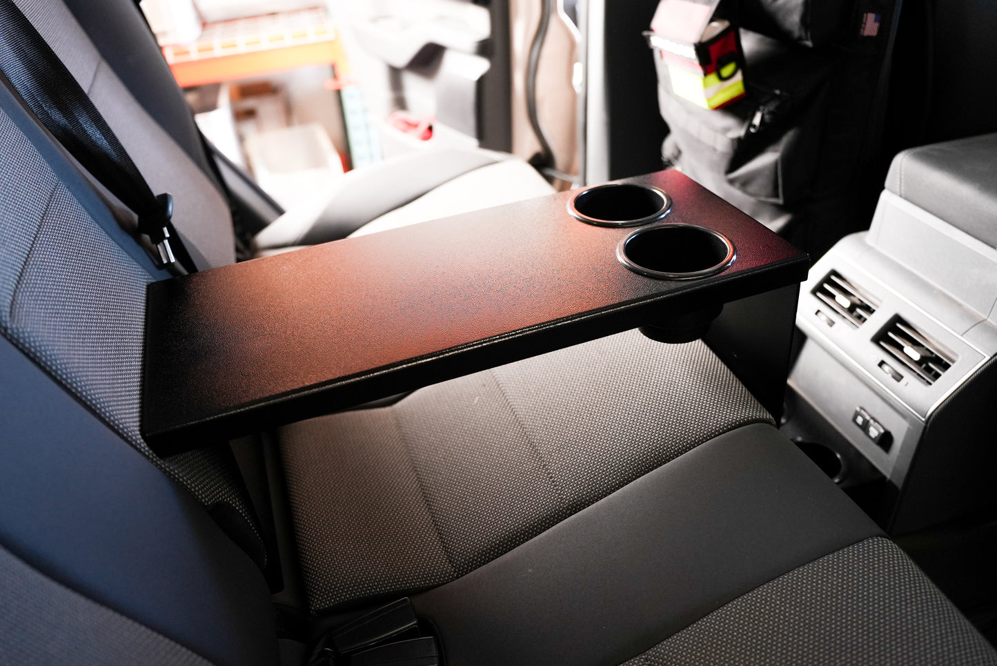 Rear Seat Arm Rest and Cupholders