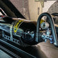 Image of a Diabolical, Inc. Rail Rack installed in a Jeep Wrangler showing a PowerTank compressor mounted on the accessory Rail Rack.