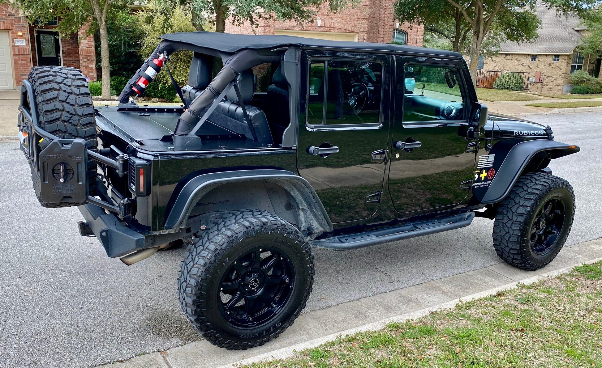 Black Jeep JKU 4-Door with the Slipstream Jeep Security Enclosure installed